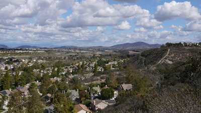 The Palacio Del Mar development soaks in the sun on a partly clear day.