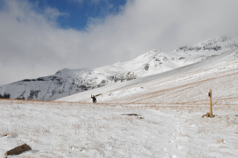 My friend nears the top of the shoulder on a snowy but beautiful day.