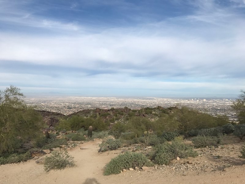 Enjoy this pleasant view of South Mountain Park and the Phoenix Metro from the top of Mormon Trail.