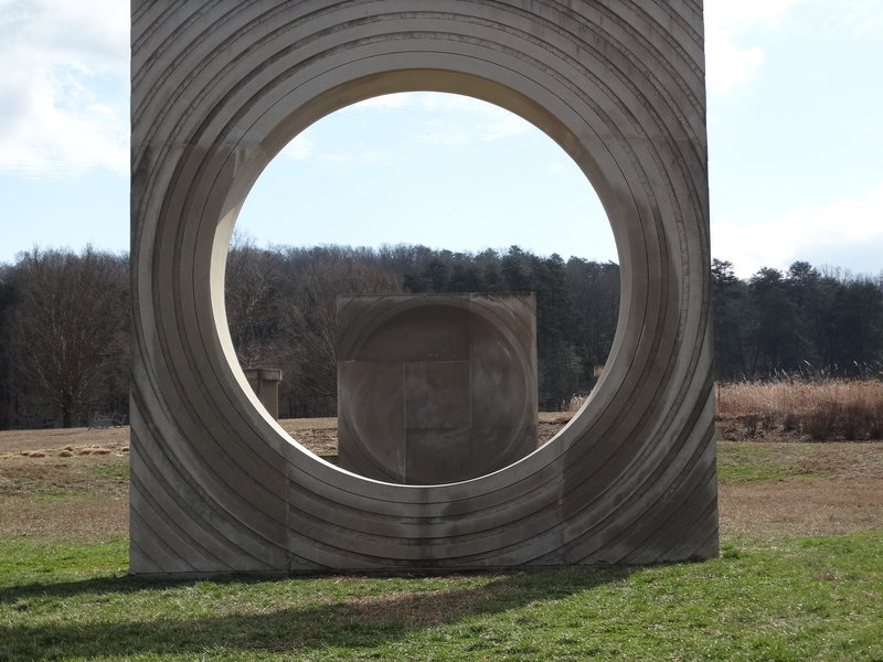 Enjoy the sculpture titled "Earth Clock" while in the arboretum.