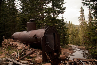An old boiler rusts near an old mine along the Elk Park Trail.
