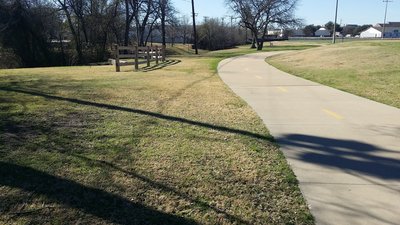The trail is smooth as it passes by Mark Twain Elementary.