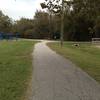 This is the west end of Cullen Park Bike and Hike Trail looking east at the trail leaving the parking lot.