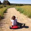 This little guy enjoys an afternoon ride as his family hikes along the Galena View Trail.