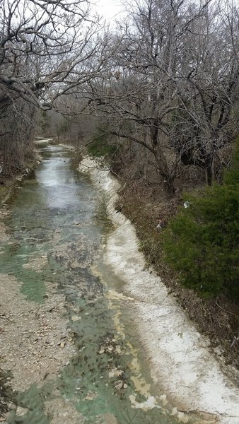 Beck Creek flows full of debris in the wintertime.