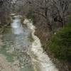 Beck Creek flows full of debris in the wintertime.