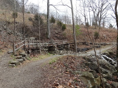 The trail crosses over a low-water creek with small falls.