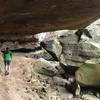 Ducking under some great rock formations is all part of the experience along the Lick Creek Trail.