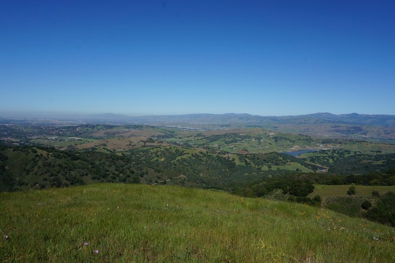 Enjoy expansive views of the valley from the top of the hill near the picnic bench.