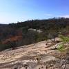 Along the Vertical Mile Challenge Trail's steep climb, enjoy this interesting rock slab and an incredible view.