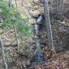 Waterfalls like this one act as your trail companion along the Sagamore Creek Loop Trail.