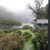 Lake MacKenzie looks beautiful in the fog from MacKenzie Hut along the Routeburn Track.