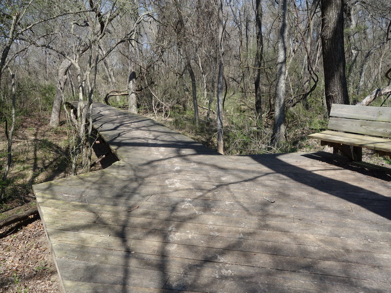 A bridge at the western end of the Wild Plum Trail aids your passage over a small creek and connects you to the Riverbottom Trail.