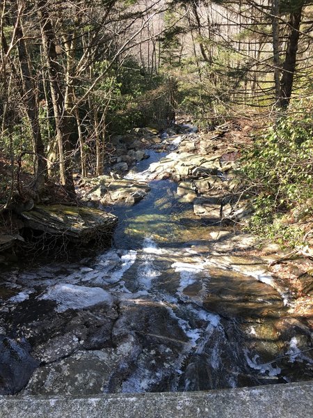 A waterfall slackens into a stream along the Flat Laurel Creek Trail.