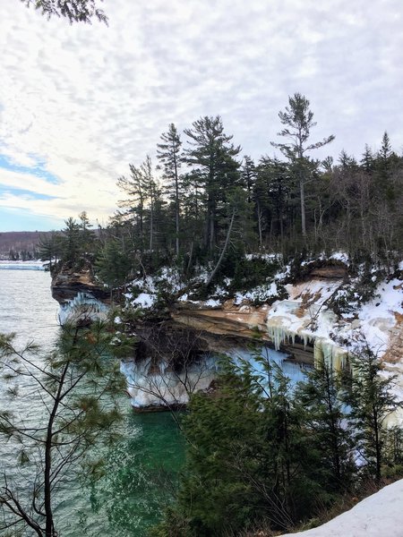 Icy cliffs surround the lakeshore in February.