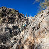 Almost to the summit, you'll have to navigate this steep, rocky section to reach your prize.