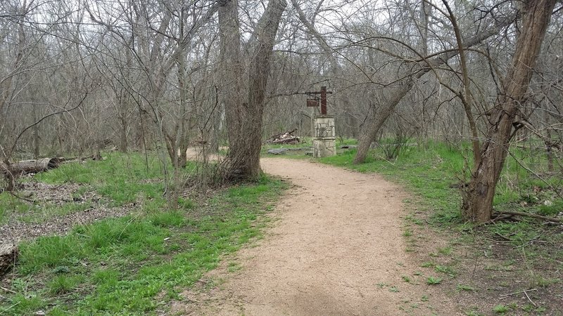 The well-maintained gravel/dirt surface of the Pecan Grove Trail provides an enjoyable soft surface for your feet.