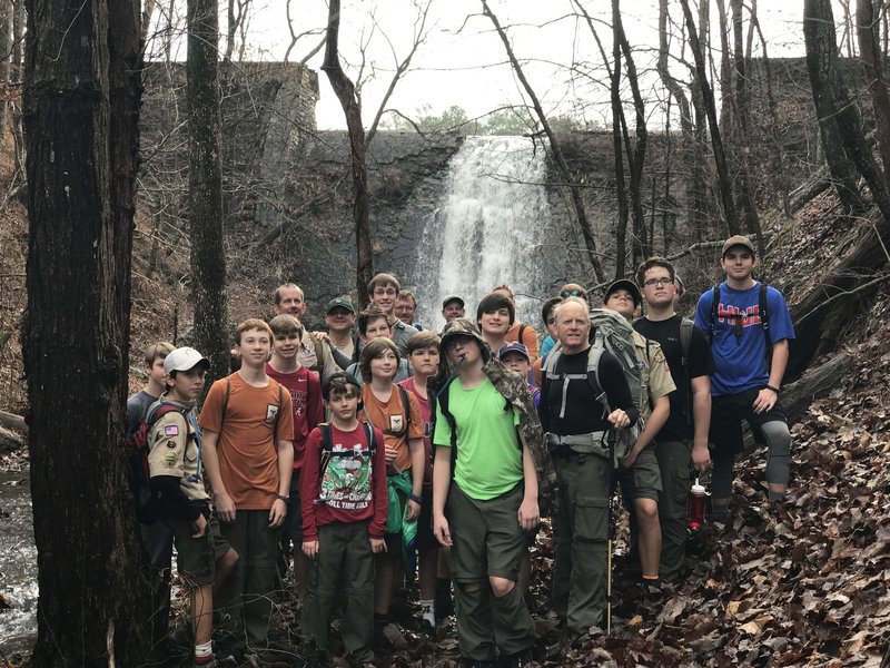 A scout group poses for a photo at the spillway.