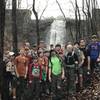 A scout group poses for a photo at the spillway.