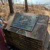 Along the trail, a monument and placard stand to commemorate the Marbury Creek Watershed Project.