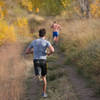 Runners from Western Washington University compete in a triathlon along the Meadowlark Trail in Bennington Lake, WA.