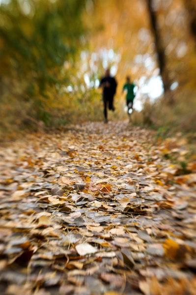 A pair enjoys a fall run at Bennington Lake.