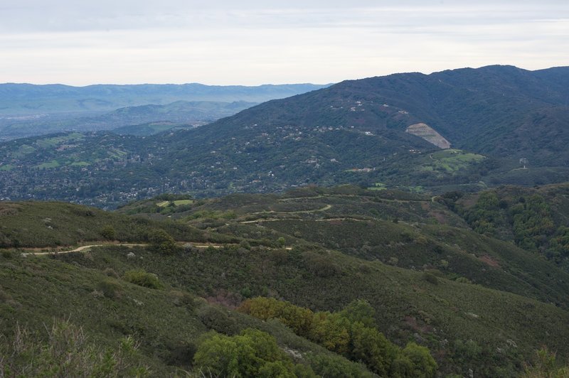 The Aquinas Trail can be seen snaking along the ridge below you in El Sereno Open Space.