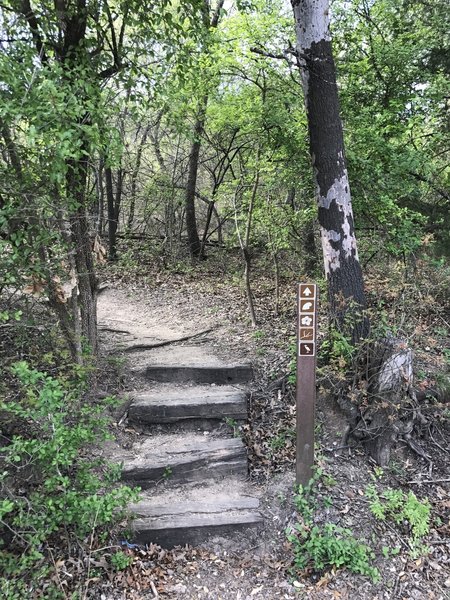 Look for these signs marking the trailhead off of Shoreline Drive.