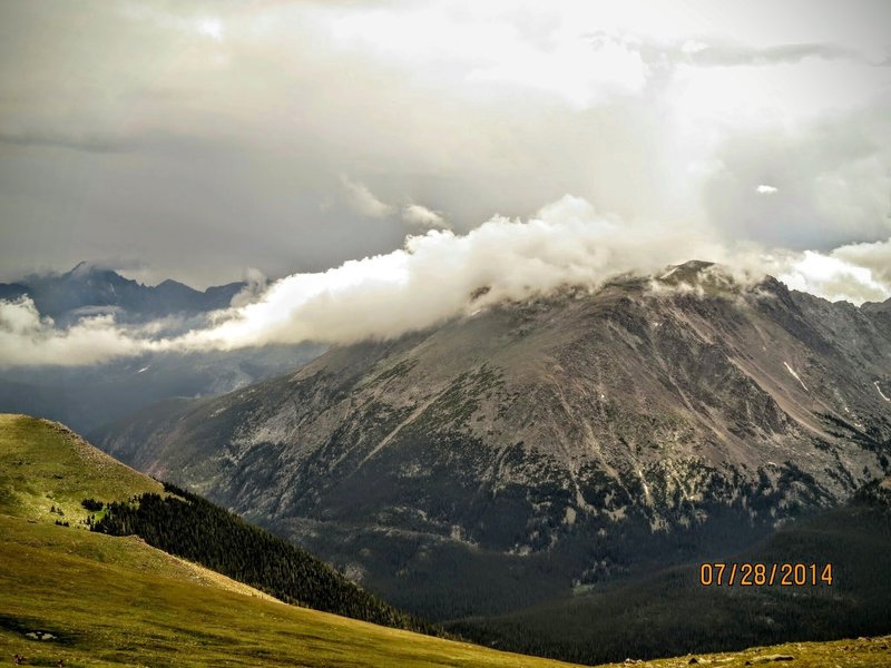 Clouds roll over the mountains across Trail Ridge Road.