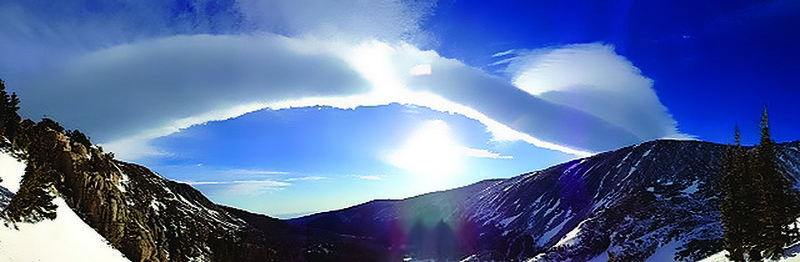 A cloud rolls over Lake Isabelle.