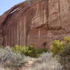 A sliver of a natural arch begins to form along the Escalante River.