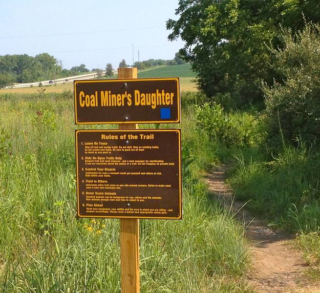 This is the trailhead located across from the first parking lot and permanent bathroom structure.