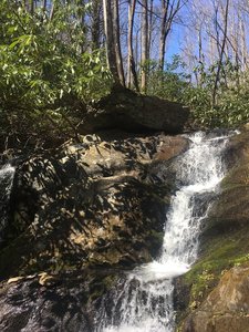 Widow's Creek cascades over the rocks near Widow's Creek Site A backcountry campsite.