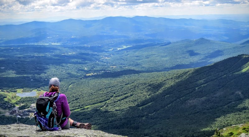 Peaceful and content after a day's hiking, you're sure to enjoy the view from "The Chin" looking down on Stowe.