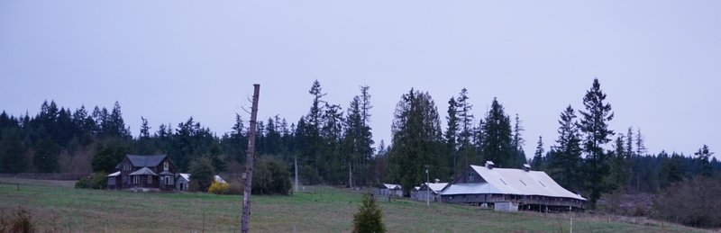 The Clear Creek Trail passes near a rustic farmhouse and barn along its route.