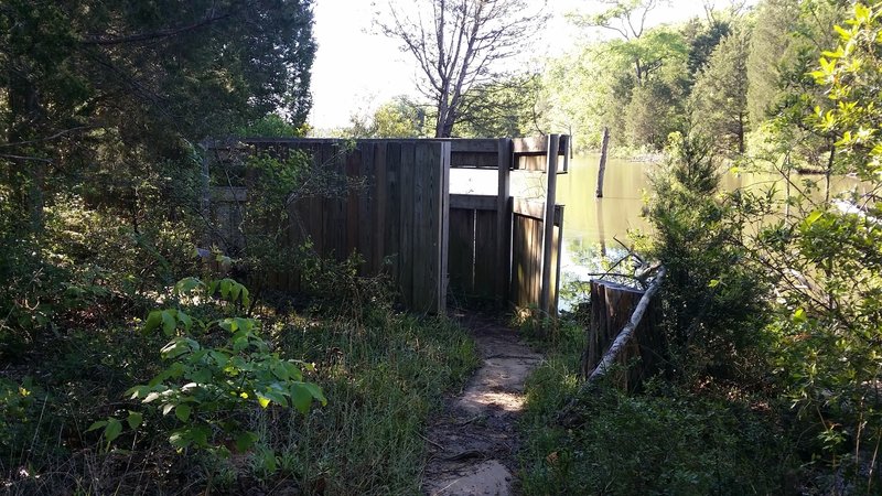 This birding blind includes a bench so you can comfortably await their arrival.