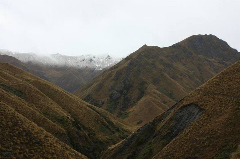 Steep tussock hills command the landscape.