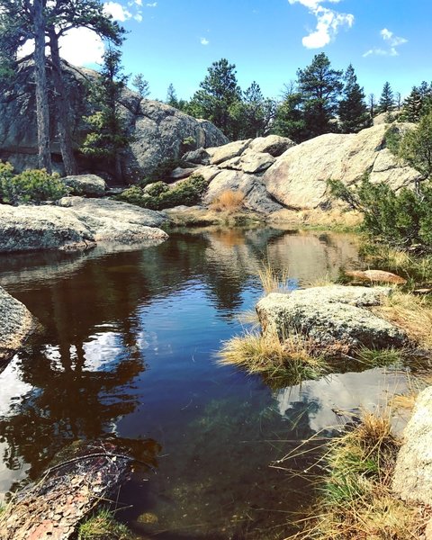 When you arrive at this pool of water, enjoy a quick look on the way up before you continue on the climb. You'll have plenty of time to enjoy it on the way down.