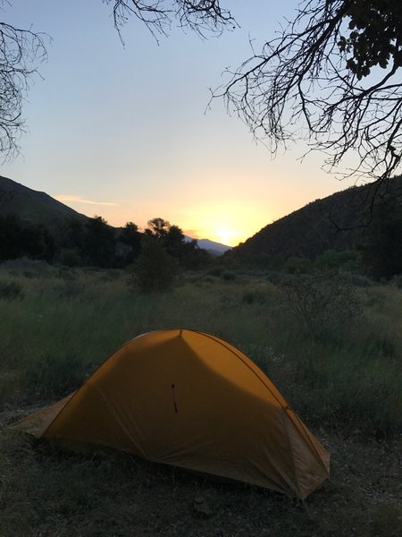 The sun rises over Hartman Camp.