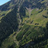 A steep chute runs down the side of Box Elder Peak.