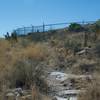 This fenced entrance was blasted into the cave so that the guano could be extracted and hauled to market.