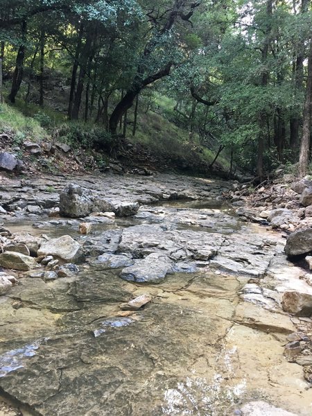 Water trickles over the rocks in Panther Canyon.