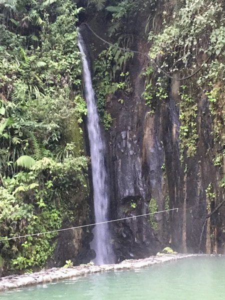 This is the "short" waterfall into a hot springs pool.