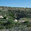 A view of the natural entrance and bat amphitheater from the trail.