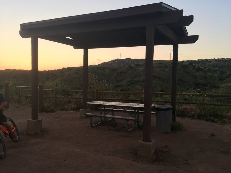 A covered picnic table about halfway up the trail.