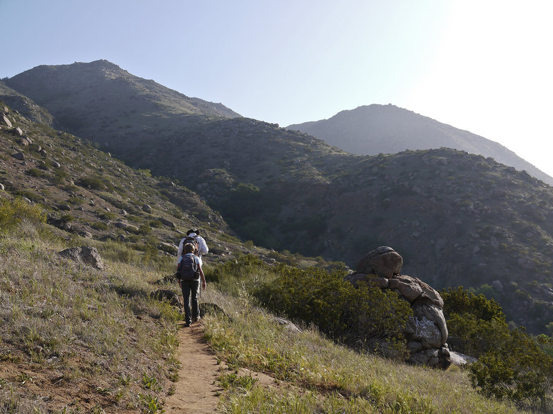 Hikers at Thelma and Louise rock early in the morning.