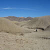 Hike through washes and mud hills to finish the Elephant Knees.