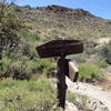 At yet another trail junction, the Dutchman and Peralta Canyon Trails are well marked.