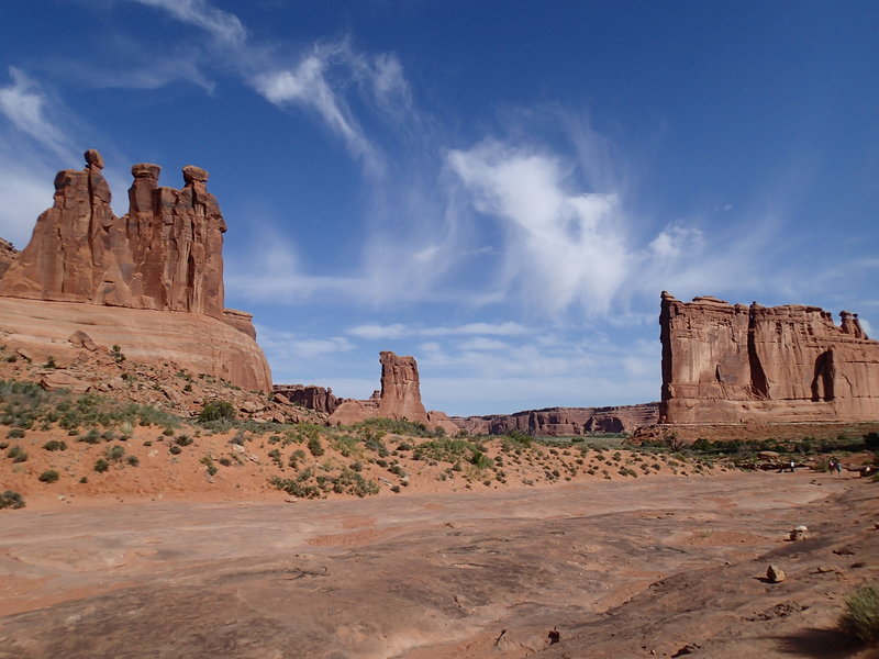Three Gossips (R), Sheep Rock (C), and Courthouse Tower (L).