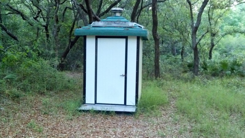 A porta-potty along the trail.